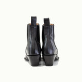 The Sandra Boot in Black Patent Leather