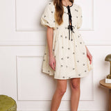 A DAY AT THE VINEYARD WOVEN MINI BADYDOLL DRESS
