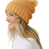 Pom Beanie with Faux Sherpa Lining